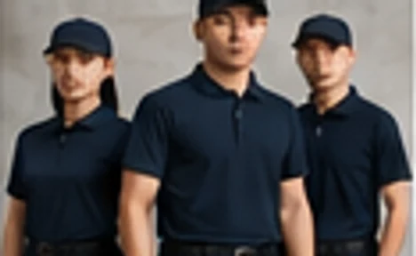 Custom uniform garments with logo placement and woven labels